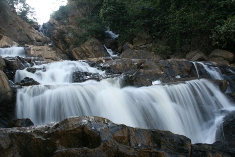 Meenmutty waterfalls -Located close to Neelimala the spectacular Meenmutty falls can be reached through a 2 km trekking route from the main road connecting Ootty and Wayanad. It is the largest of waterfalls in the district of Wayanad.